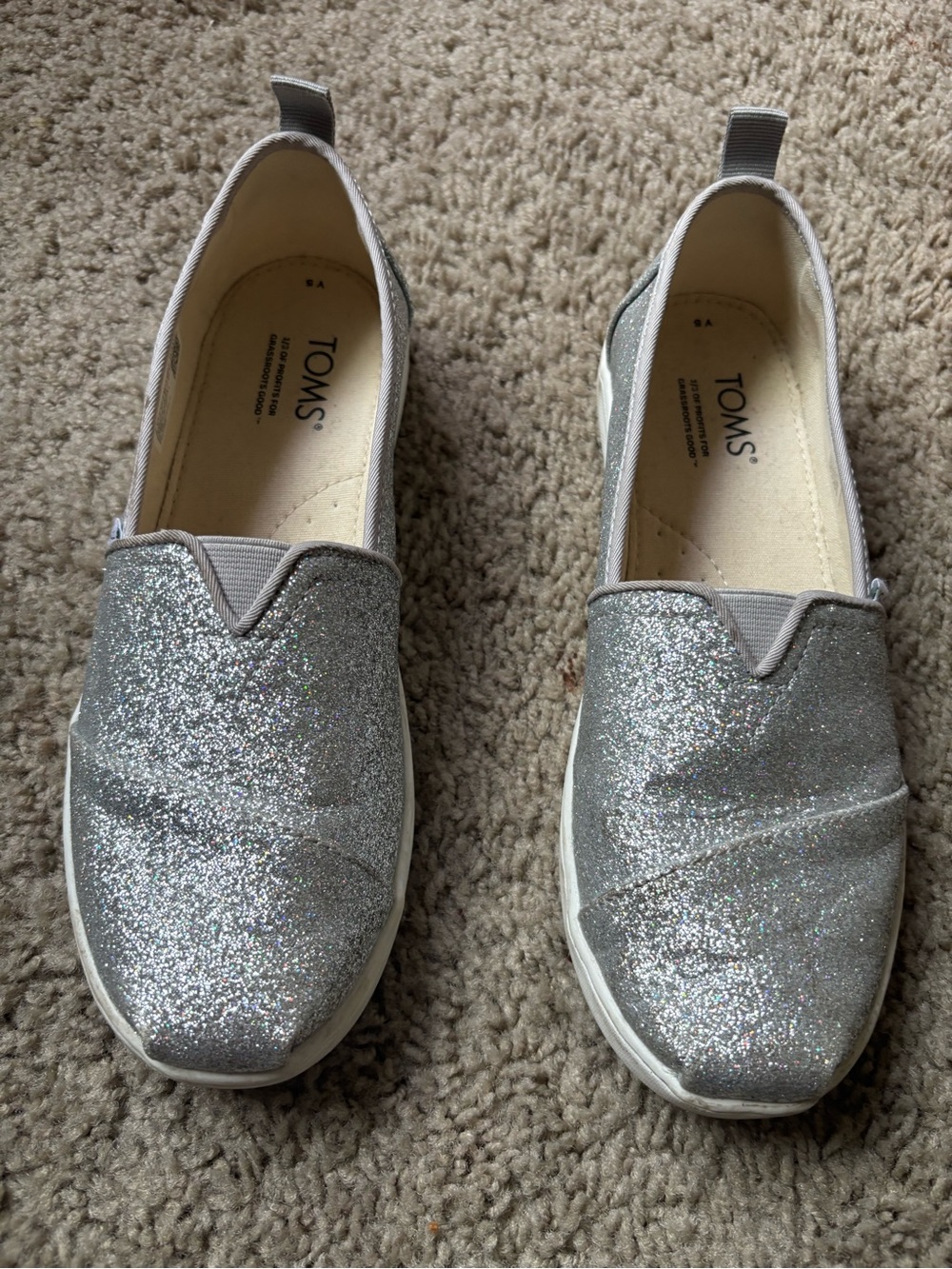 TOMS silver sparkle slip on shoe